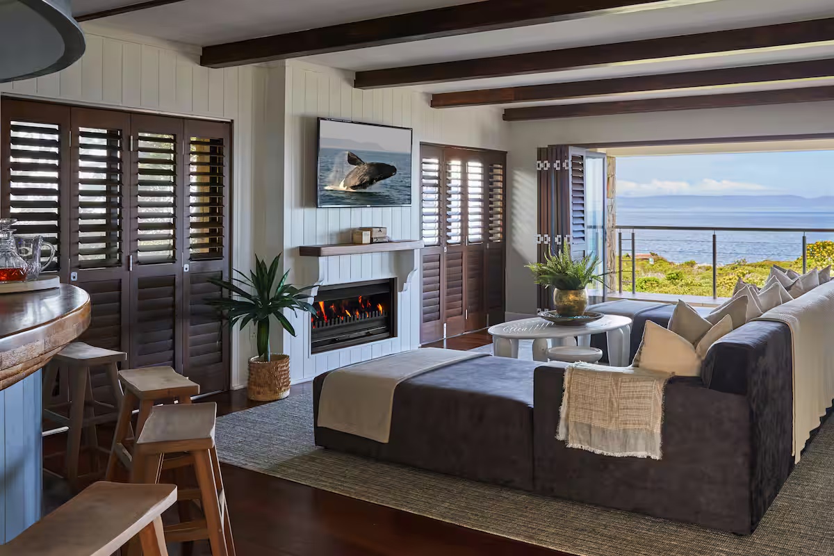 Lounge with fireplace and ocean view