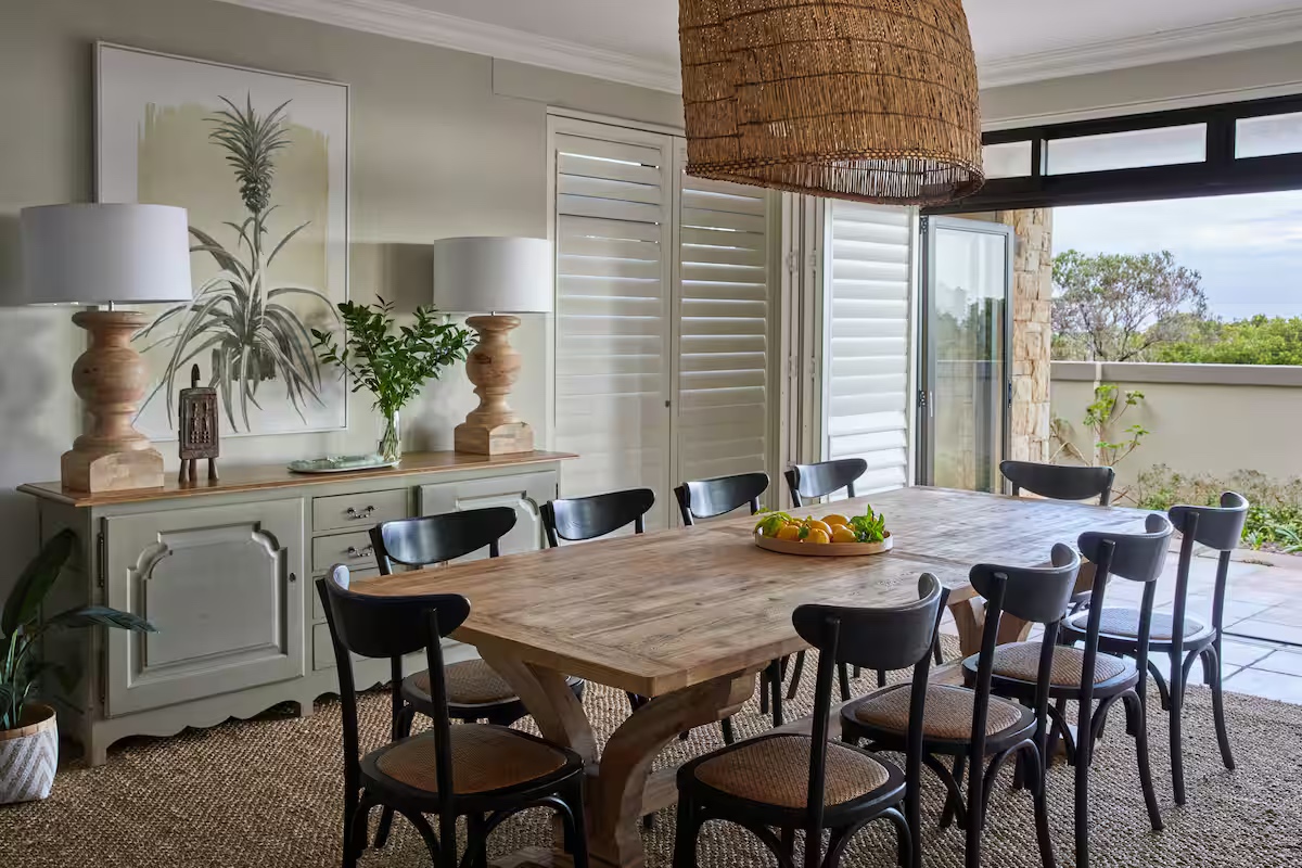 Long dining table with ten chairs