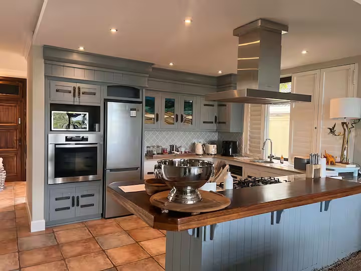 Open kitchen with island and bar seating